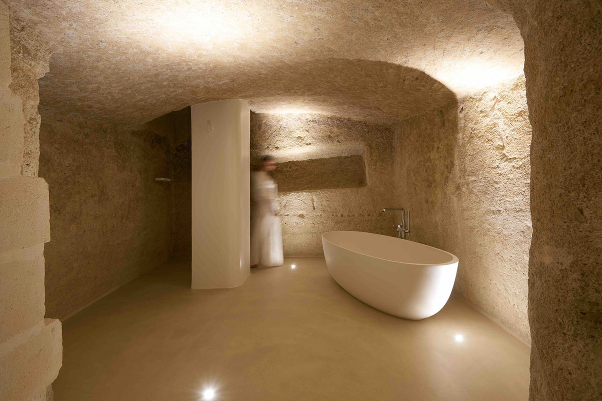 Interiors of this cave hotel and spa by Simone Micheli act like work of art with excavated surfaces