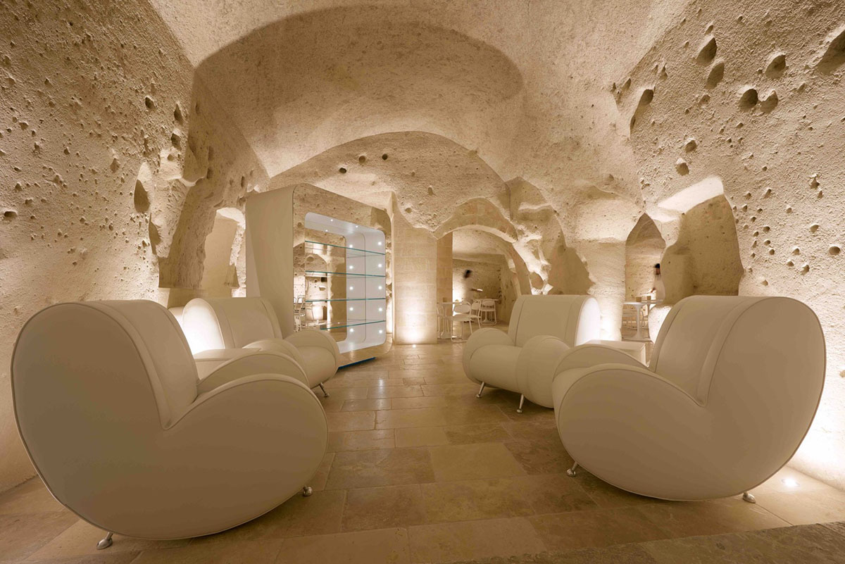 Interiors of this cave hotel and spa by Simone Micheli act like work of art with excavated surfaces