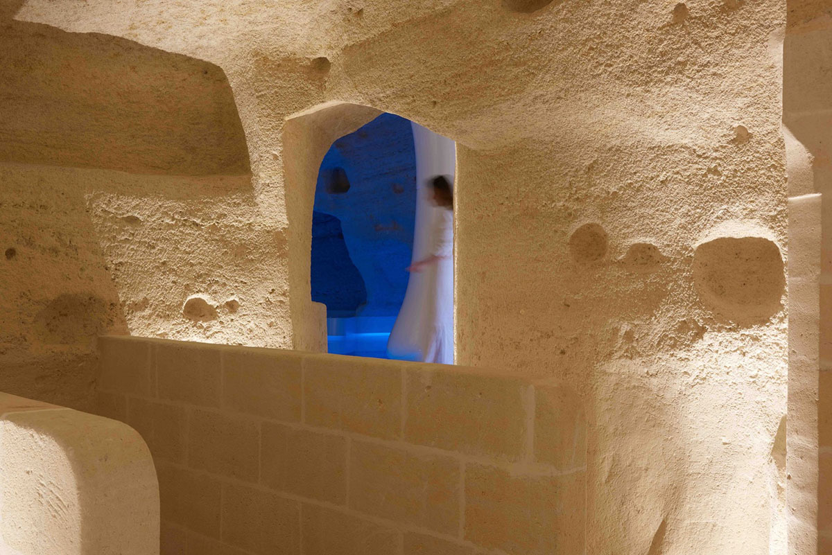 Interiors of this cave hotel and spa by Simone Micheli act like work of art with excavated surfaces