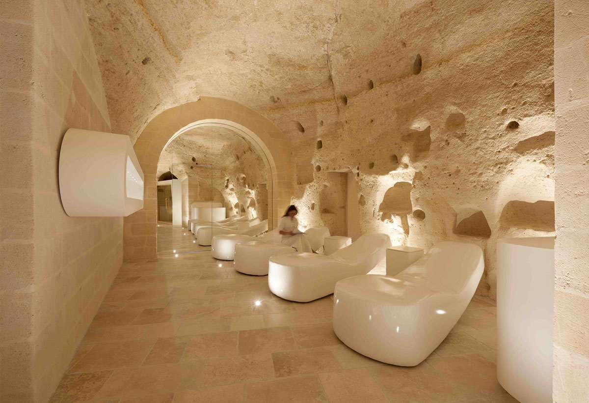 Interiors of this cave hotel and spa by Simone Micheli act like work of art with excavated surfaces