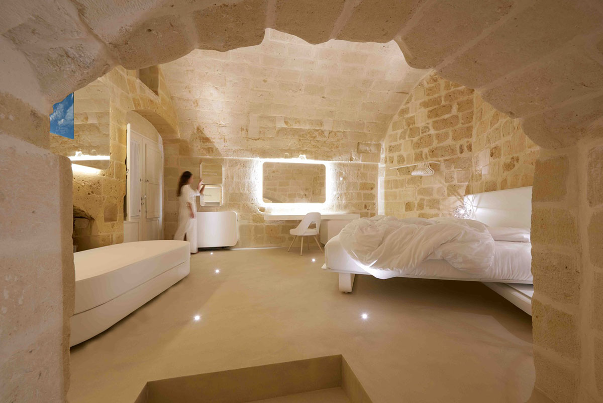 Interiors of this cave hotel and spa by Simone Micheli act like work of art with excavated surfaces