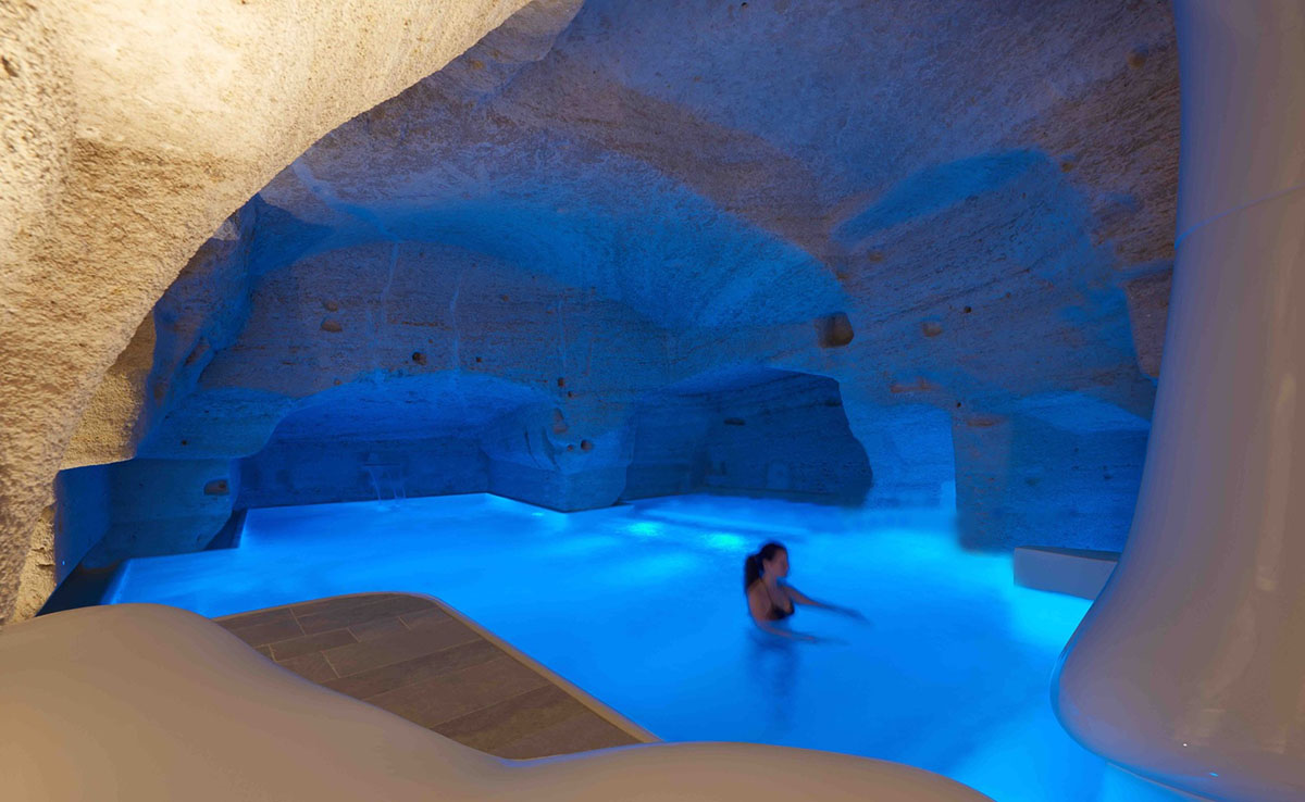 Interiors of this cave hotel and spa by Simone Micheli act like work of art with excavated surfaces