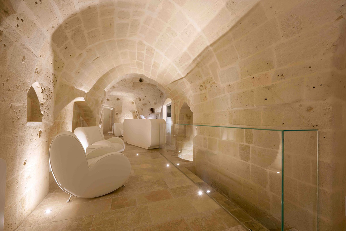 Interiors of this cave hotel and spa by Simone Micheli act like work of art with excavated surfaces