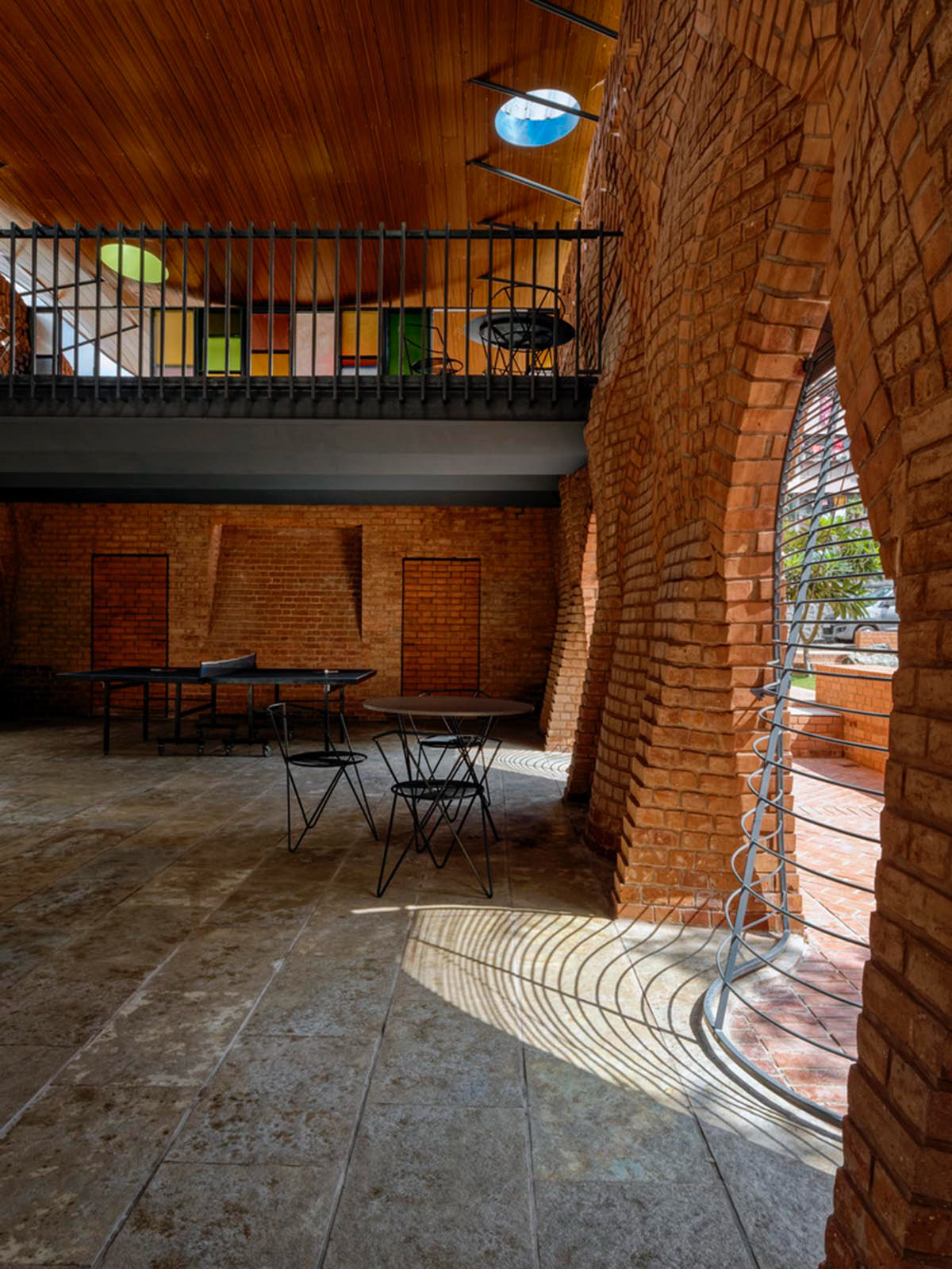 PMA madhushala's community center features undulating and artistic brick walls in Pune