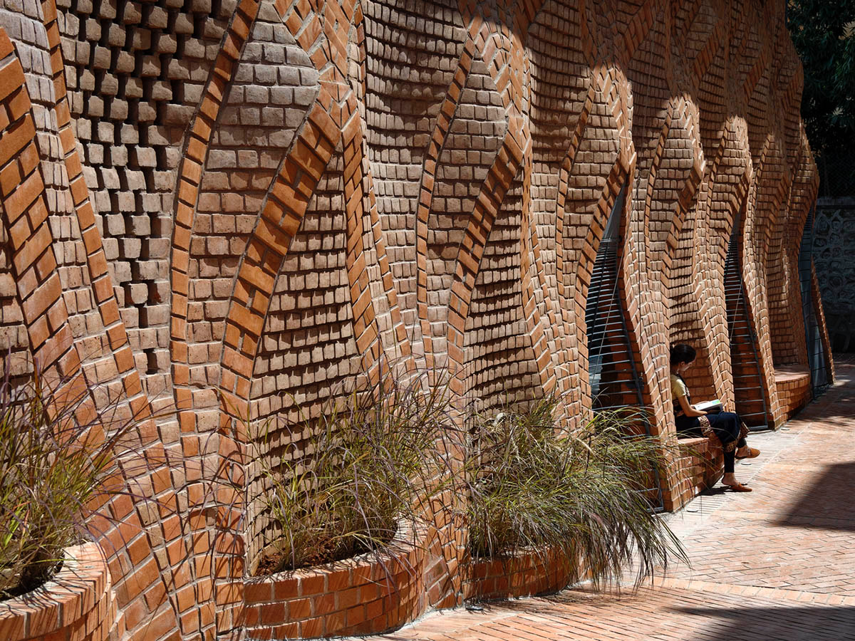 PMA madhushala's community center features undulating and artistic brick walls in Pune