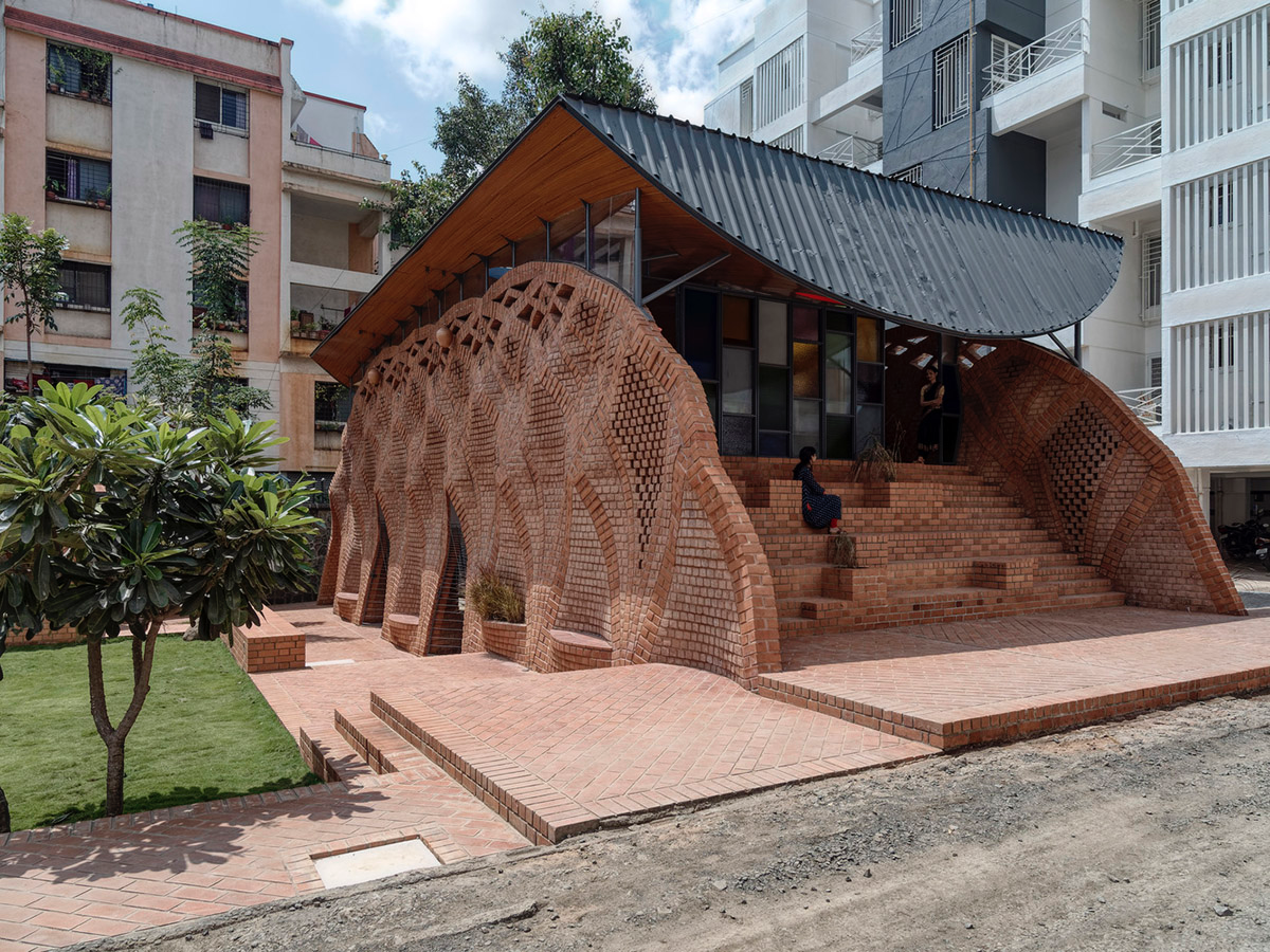 PMA madhushala's community center features undulating and artistic brick walls in Pune