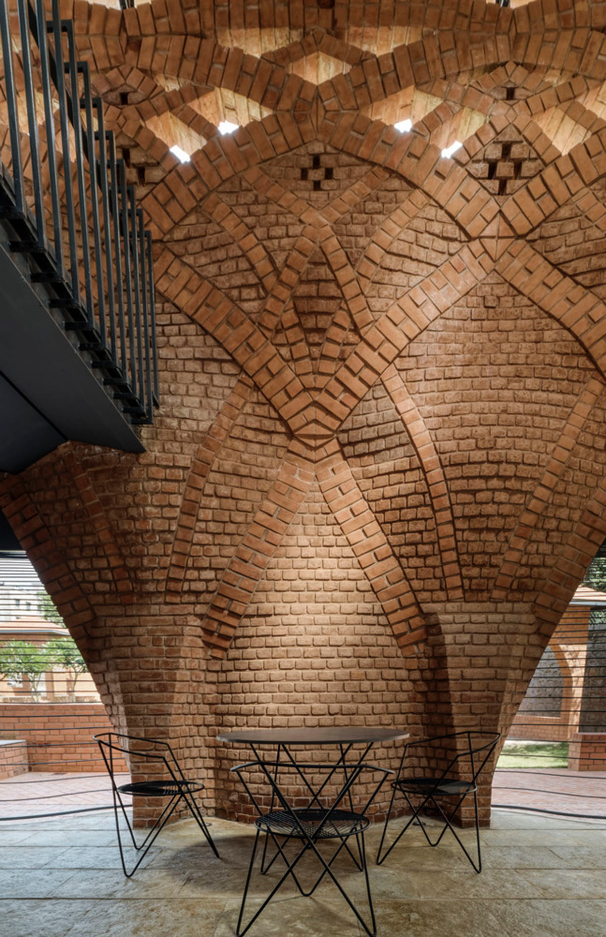 PMA madhushala's community center features undulating and artistic brick walls in Pune