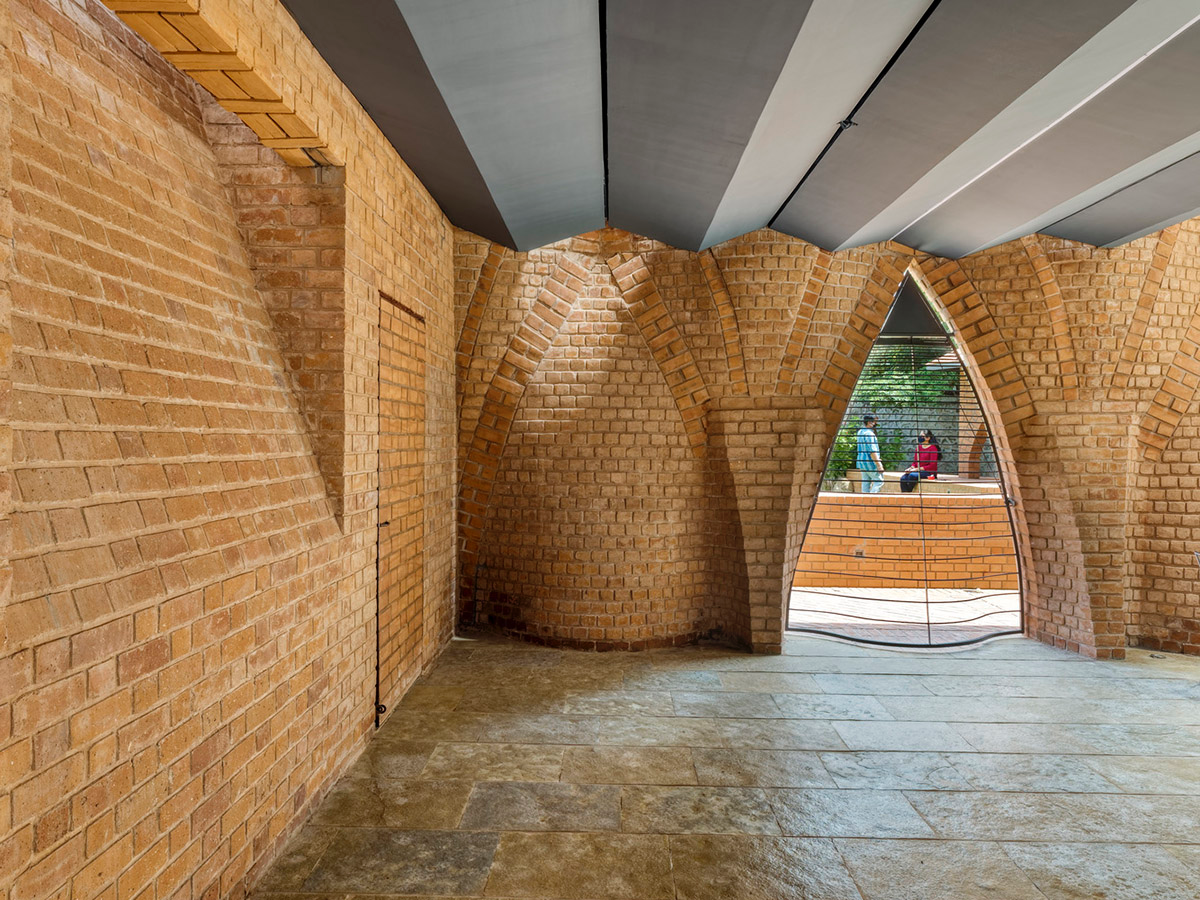 PMA madhushala's community center features undulating and artistic brick walls in Pune