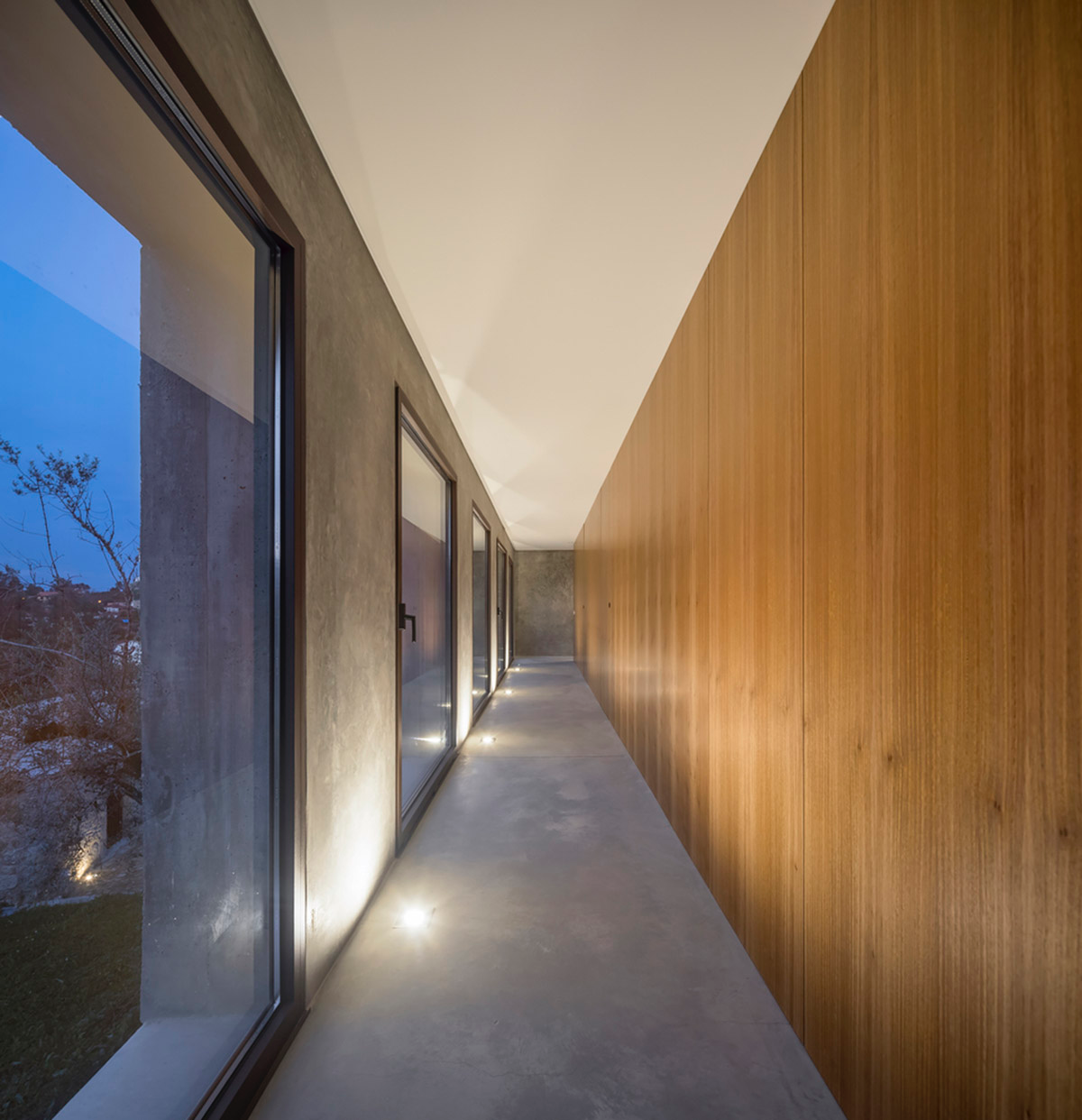 Concrete house by Germano de Castro Pinheiro Arquitectos creates pure balance between old and new