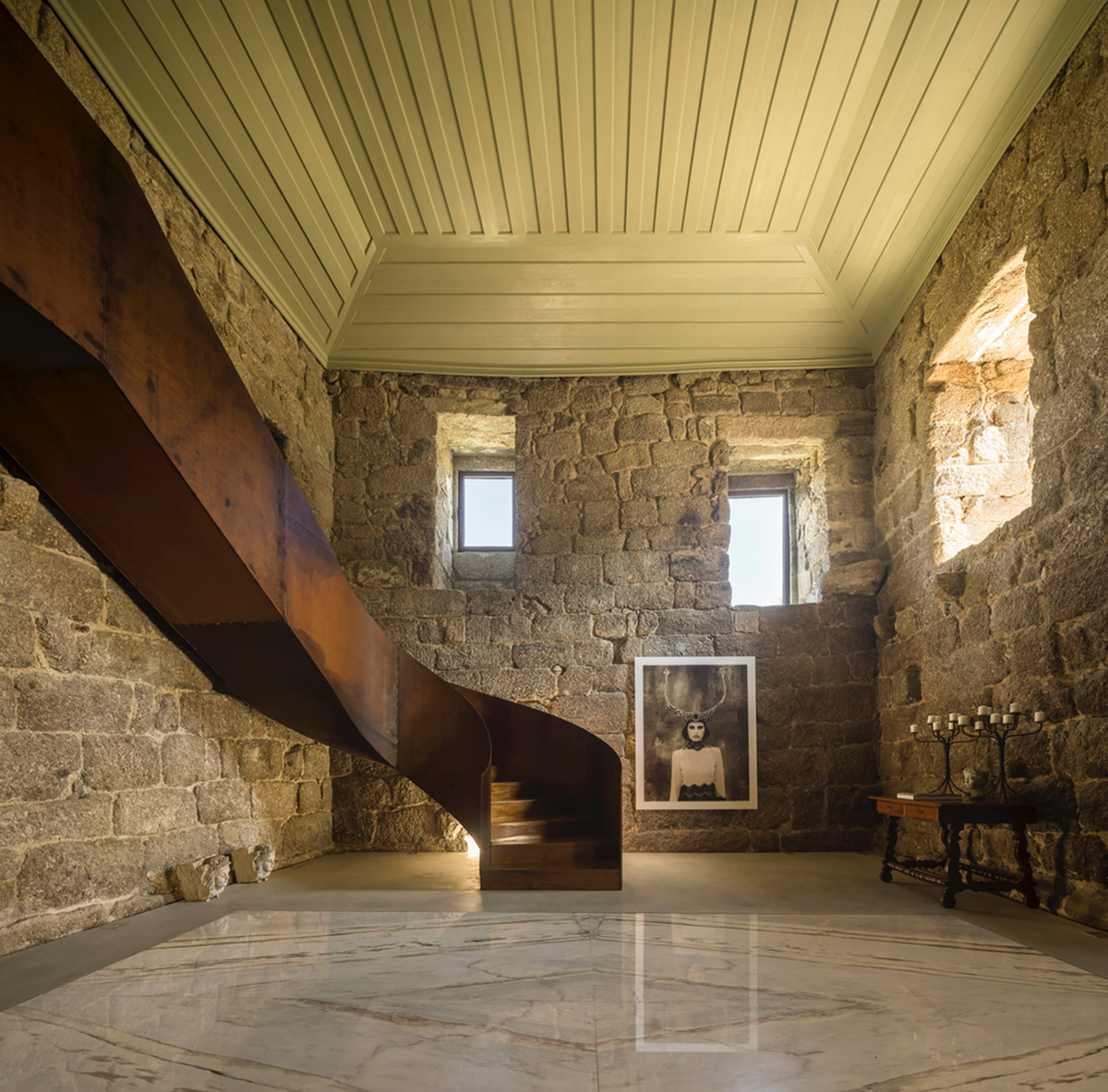 Concrete house by Germano de Castro Pinheiro Arquitectos creates pure balance between old and new