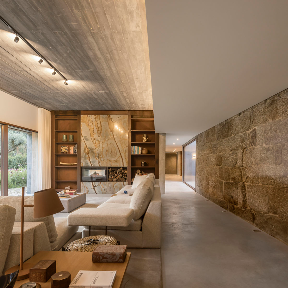 Concrete house by Germano de Castro Pinheiro Arquitectos creates pure balance between old and new