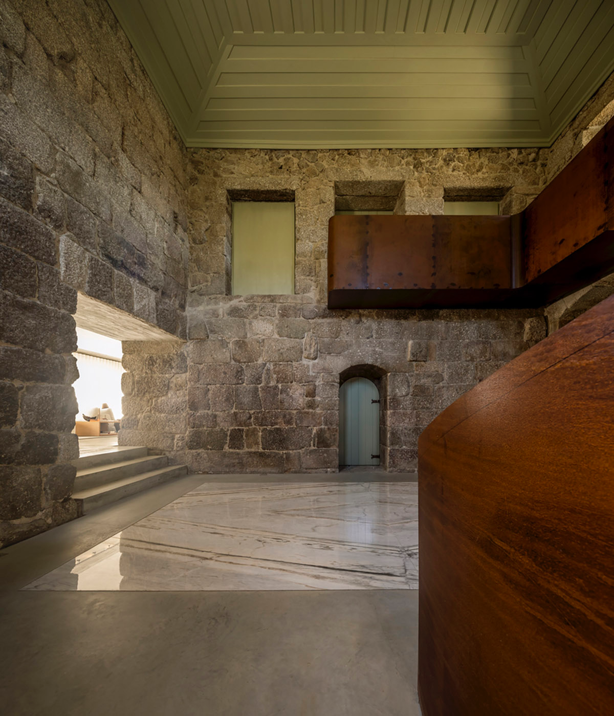 Concrete house by Germano de Castro Pinheiro Arquitectos creates pure balance between old and new