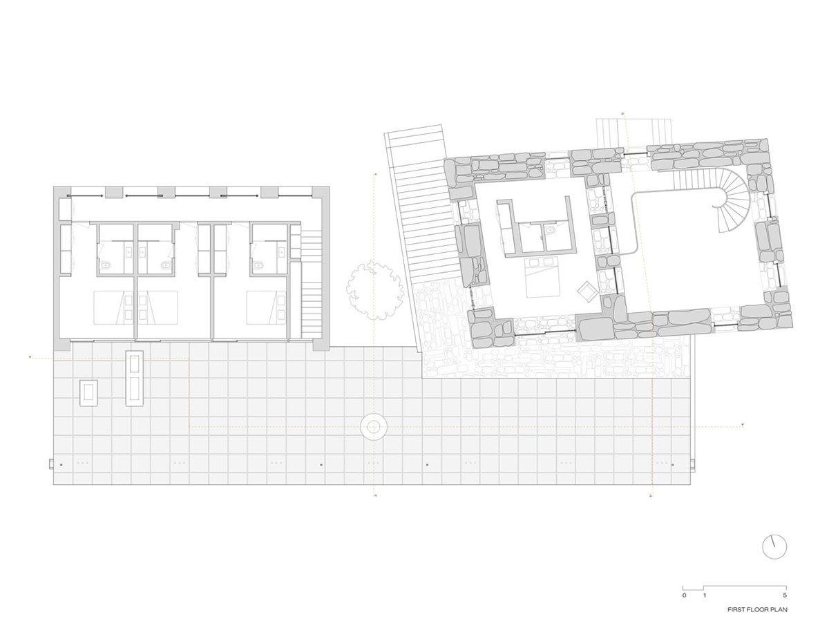 Concrete house by Germano de Castro Pinheiro Arquitectos creates pure balance between old and new