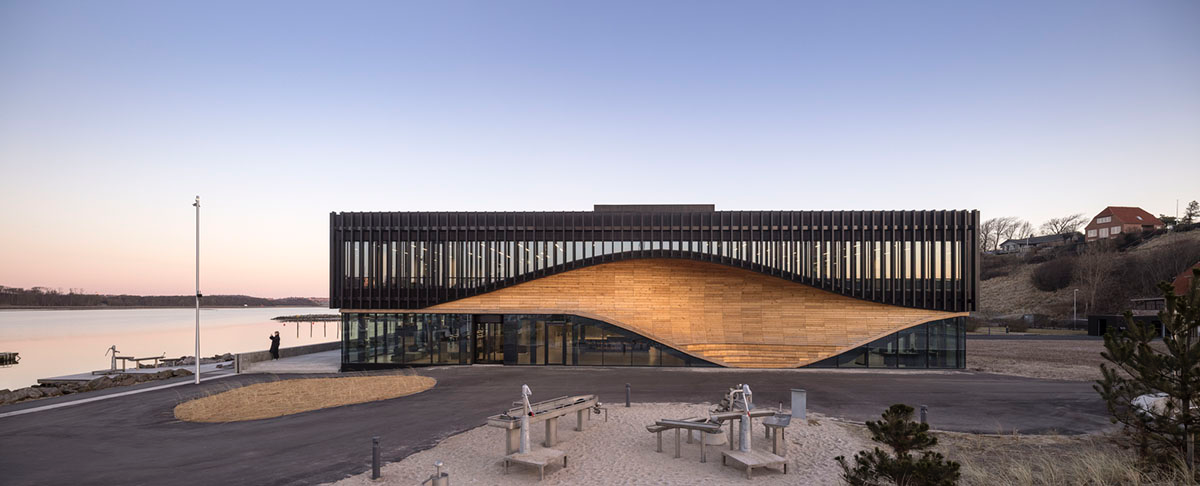 3XN Architects and SLA Architects complete Klimatorium featuring wooden wave in Denmark