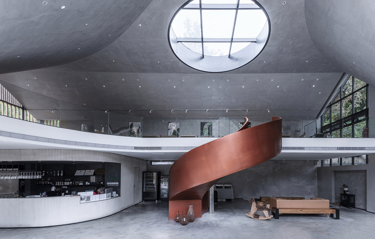 Wildurban Architects completes restaurant with cave-like roof in a forest in Huizhou, China