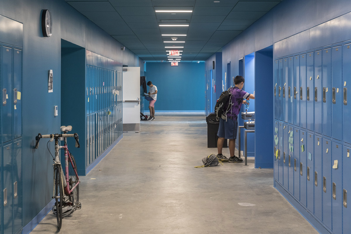 Five rectangular volumes rotating around a fixed pivot point form BIG-designed educational building