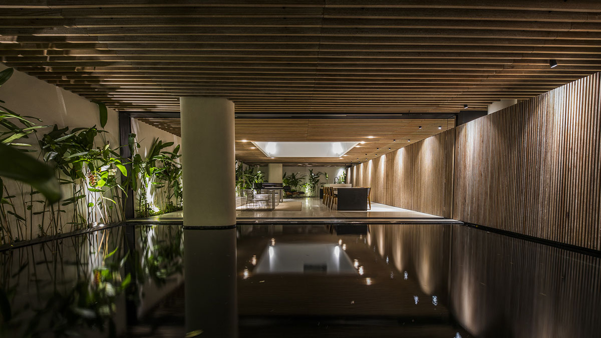 MIA Design Studio compensates the lack of green spaces of Vietnam with planted pop-up balconies