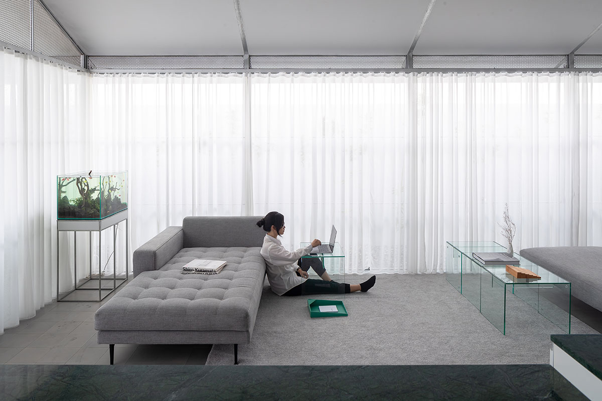 MIA Design Studio completes family house with angular roof in Vietnam 