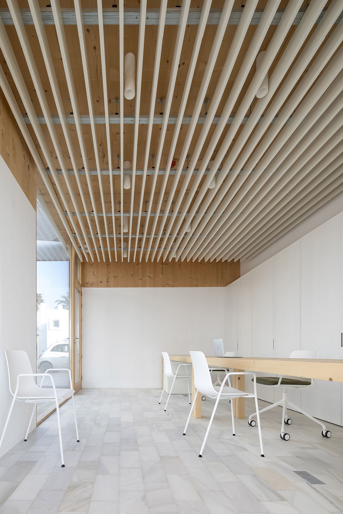 Marià Castelló Architecture completes Water Sports Center with permeable geometry in Formentera