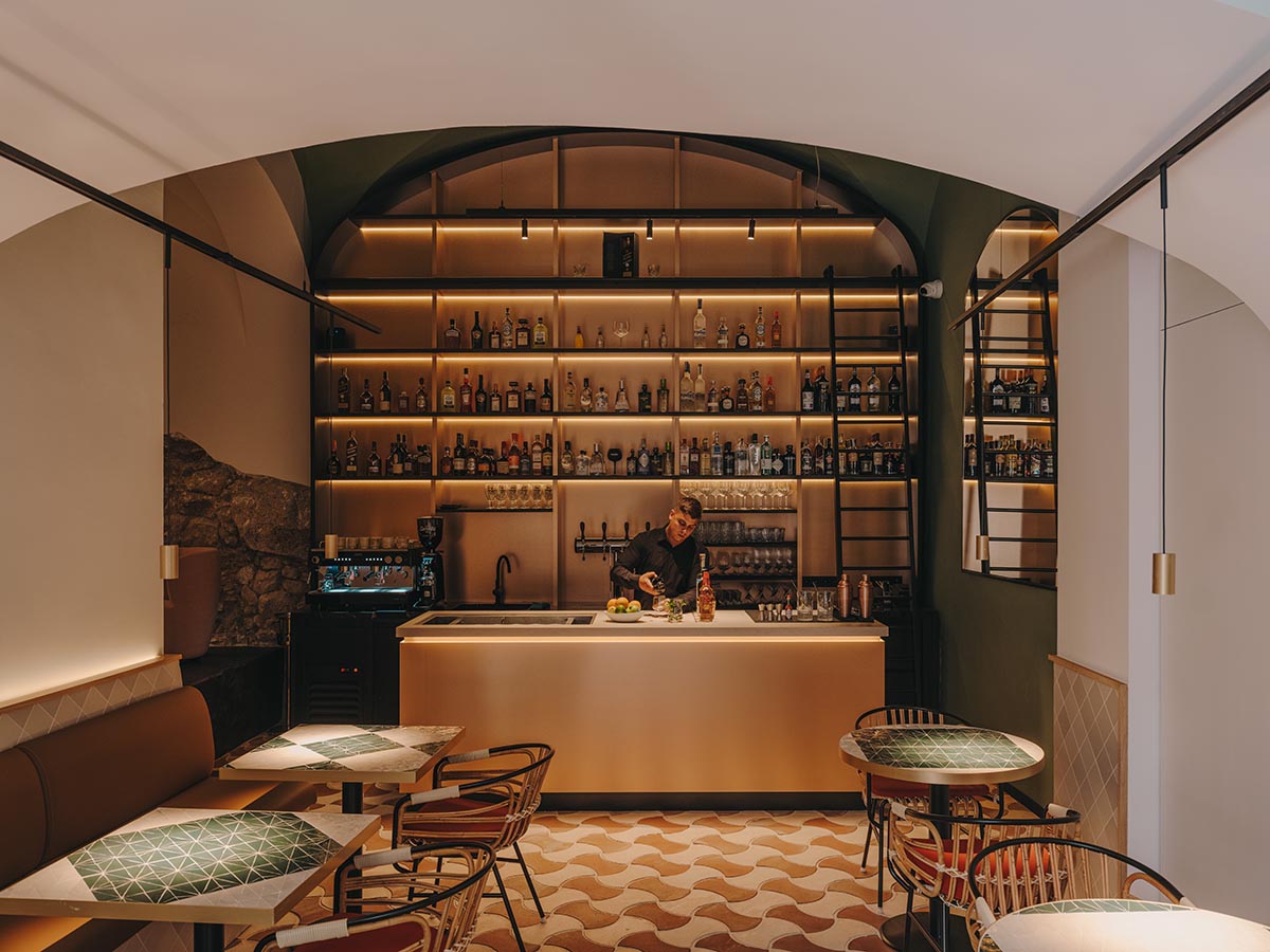 El Equipo Creativo converts 18th-century palace into hotel with rich textures and colors in Girona