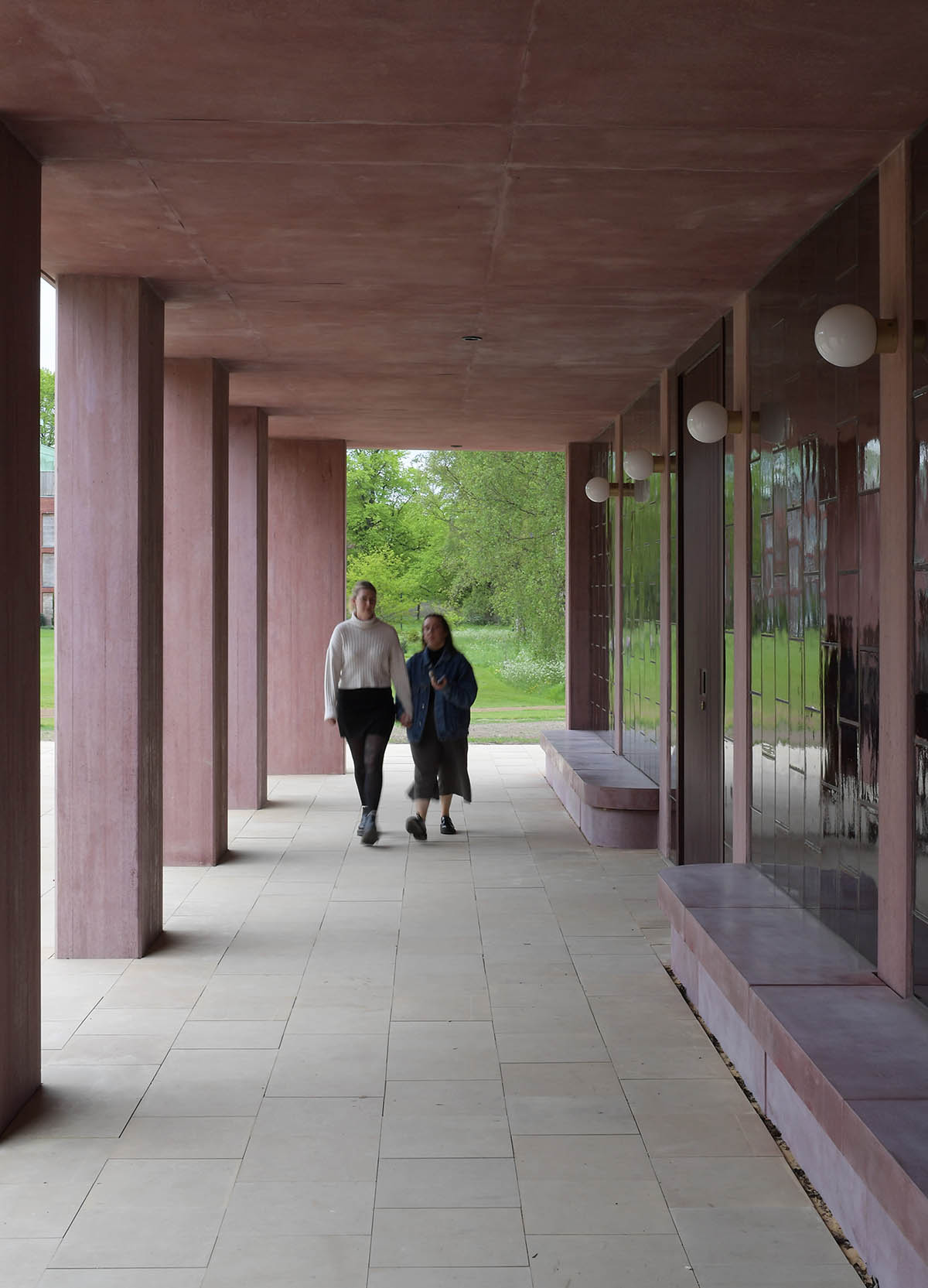 Feilden Fowles completes dining hall wrapped in green faience tiles at University of Cambridge