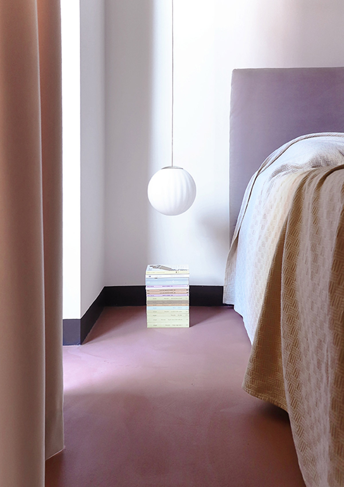 La Macchina Studio revives old apartment with theatrical and colorful interiors in Rome