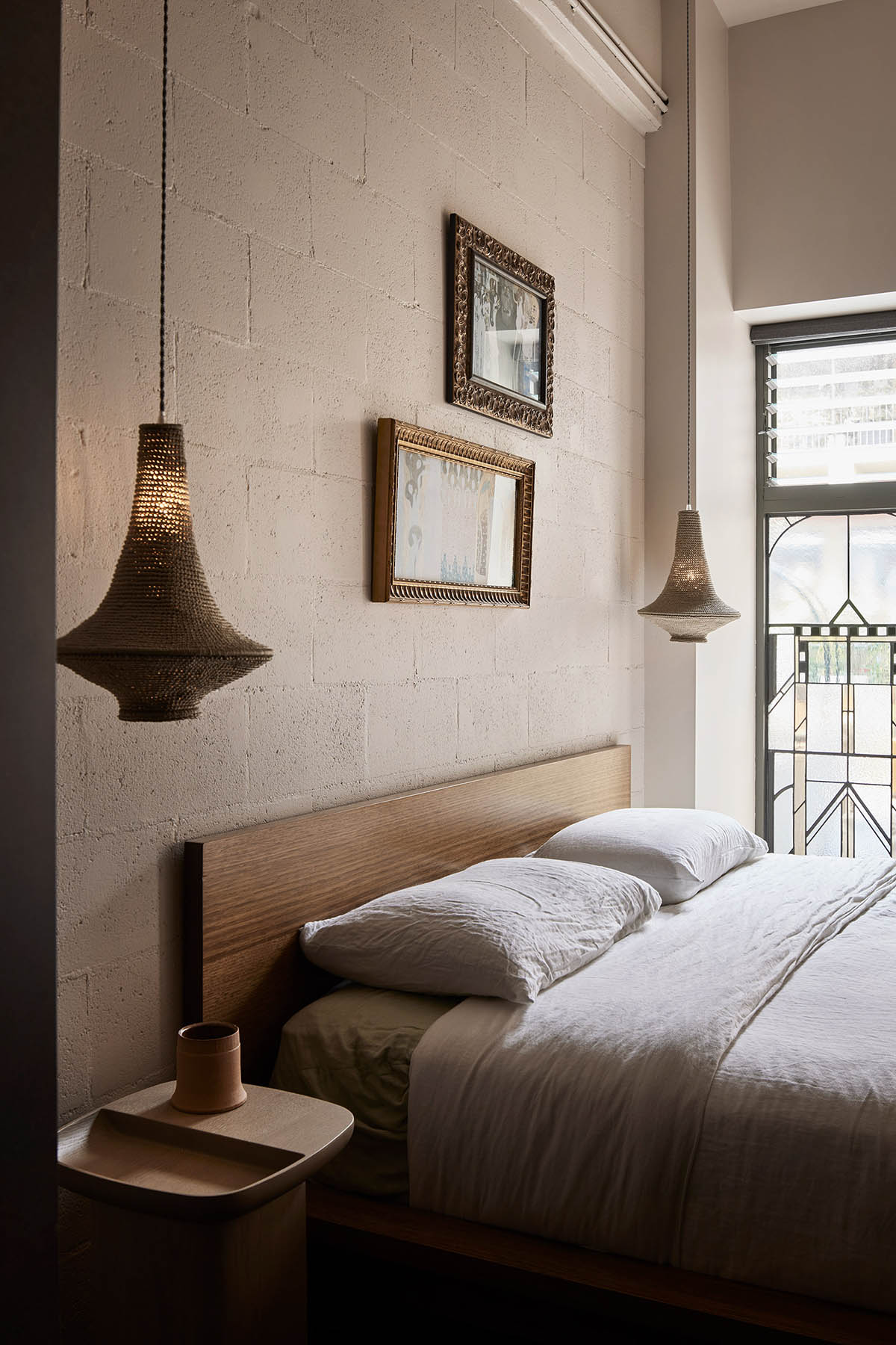 Splinter Society transforms former chocolate factory warehouse flat with earthy and rustic tones