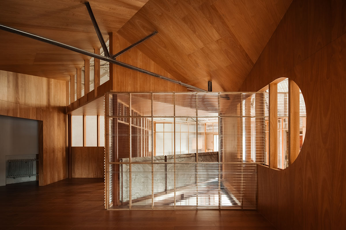 Atelier tao+c creates a crystal-like showroom with two stacked timber volumes in Beijing 