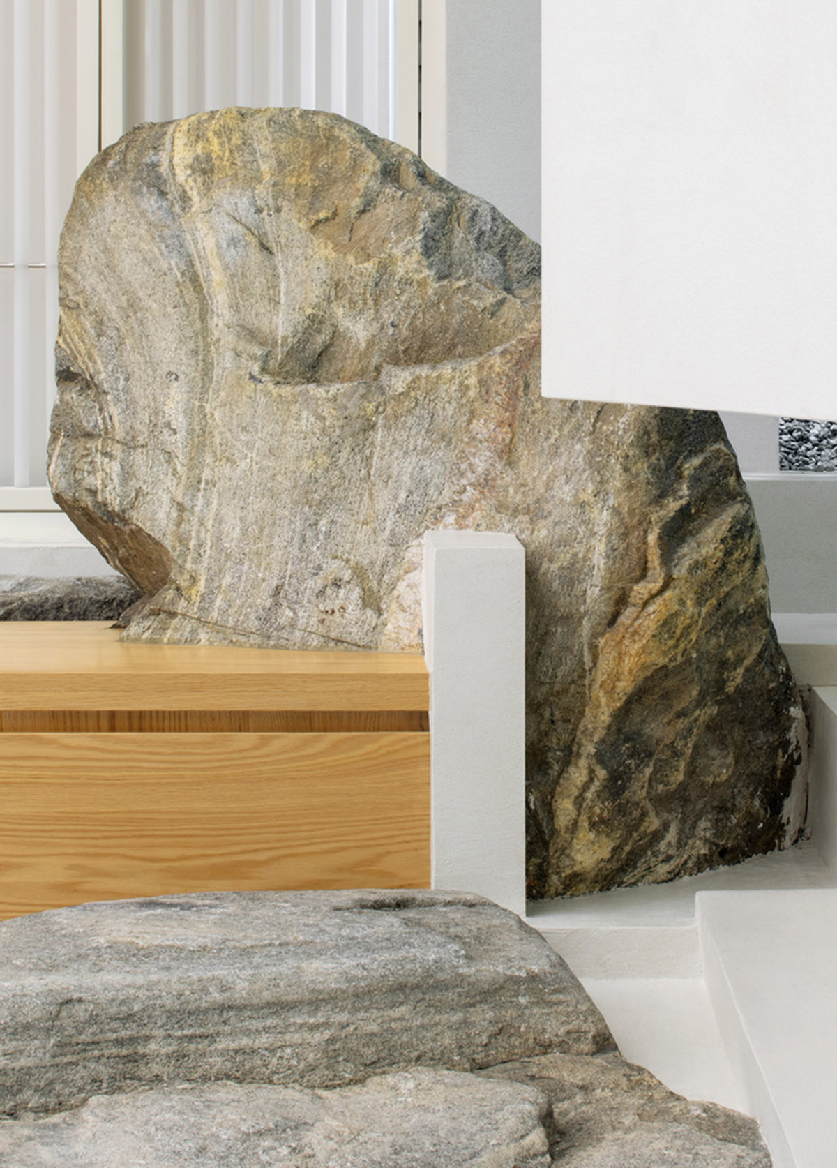 Jiejie studio wraps this tea room with a peach garden with rocky and forest landscape in Beijing