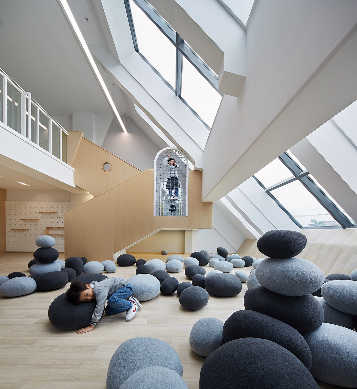 ELTO Consultancy's kindergarten features metallic curved slide to create interactive space