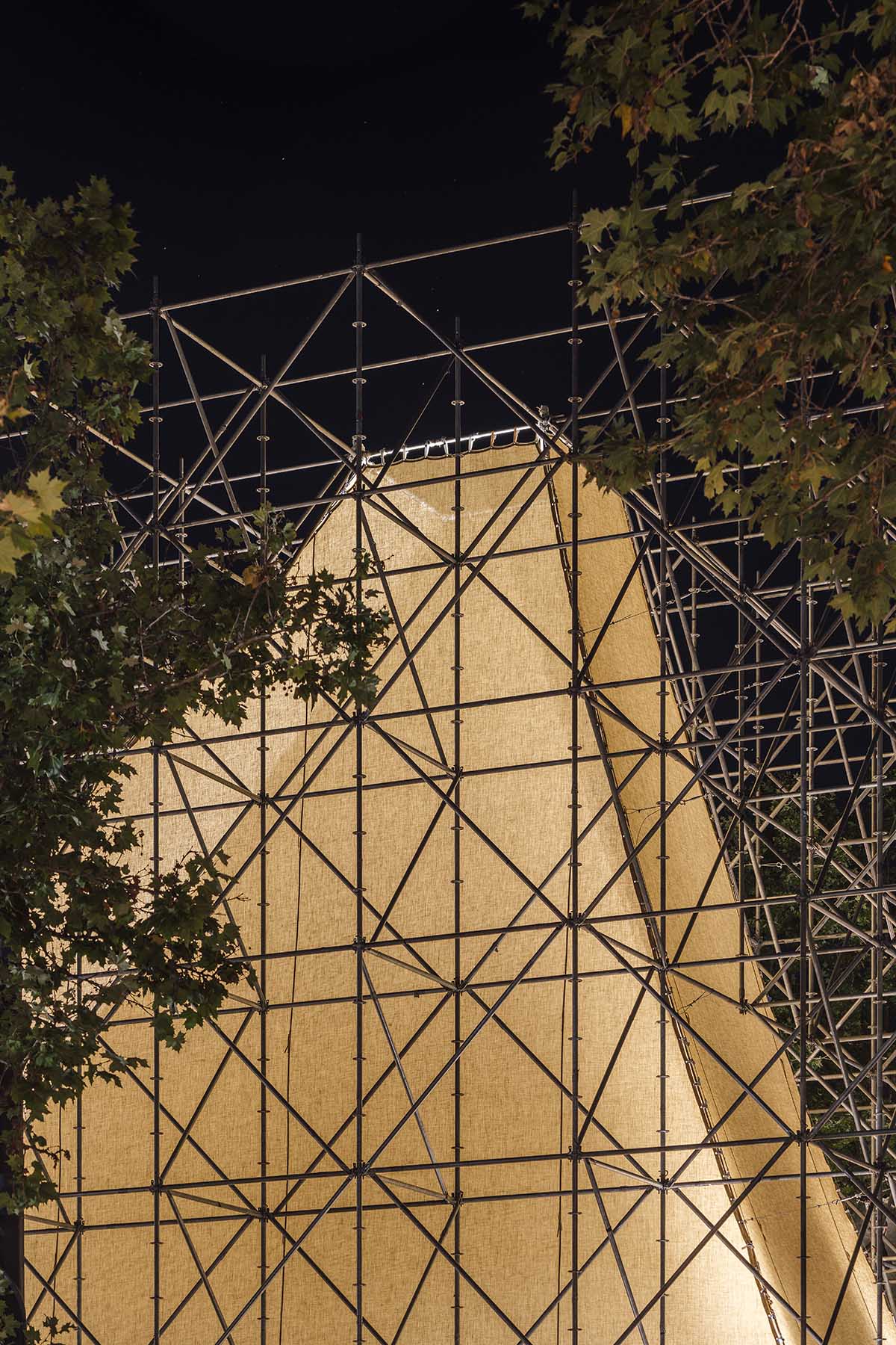 Aire Pavilion wrapped by giant scaffolding represents 