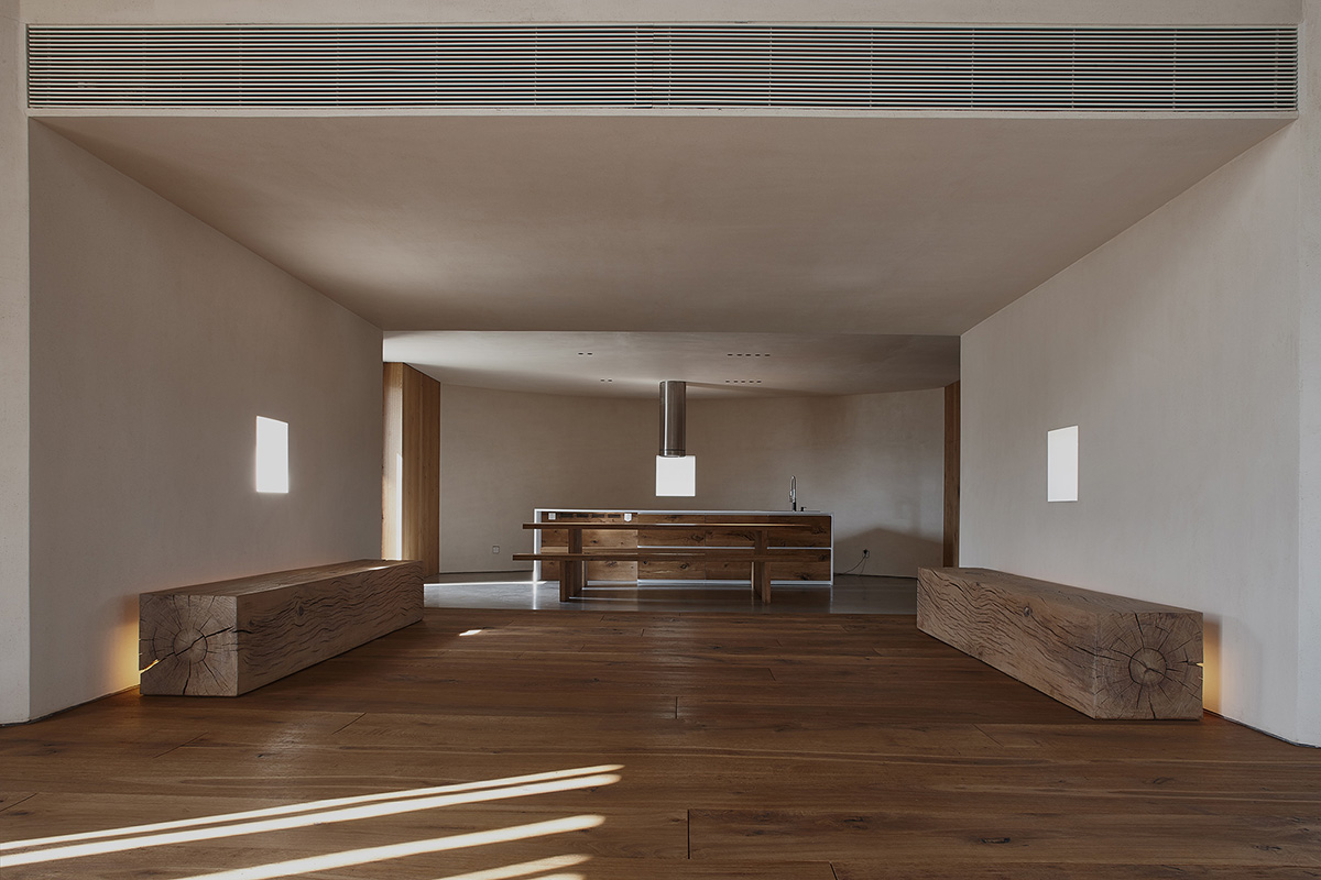 ZMY Design creates earth-toned interiors for a woodwork enthusiast’s house in Fujian, China