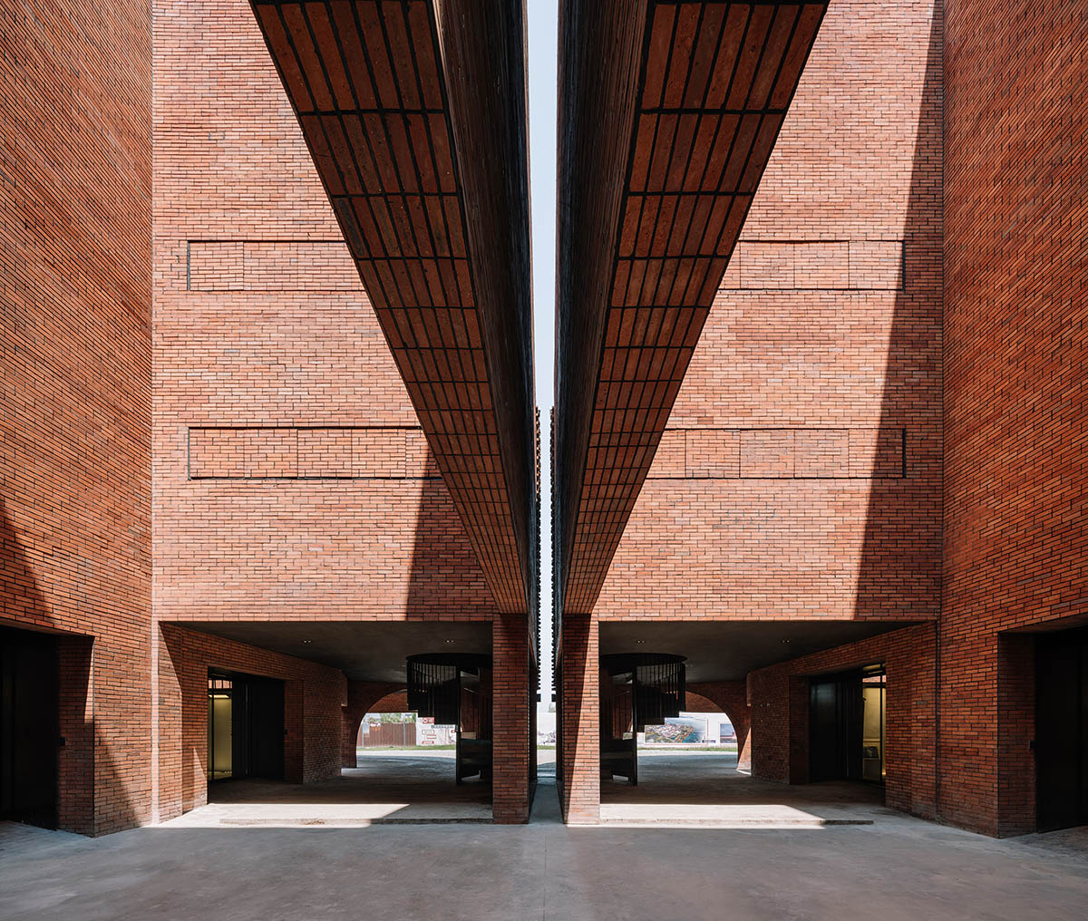 Roarc Renew repurposes old granaries as an art centre with flowing brick corridors in Jiaxing, China