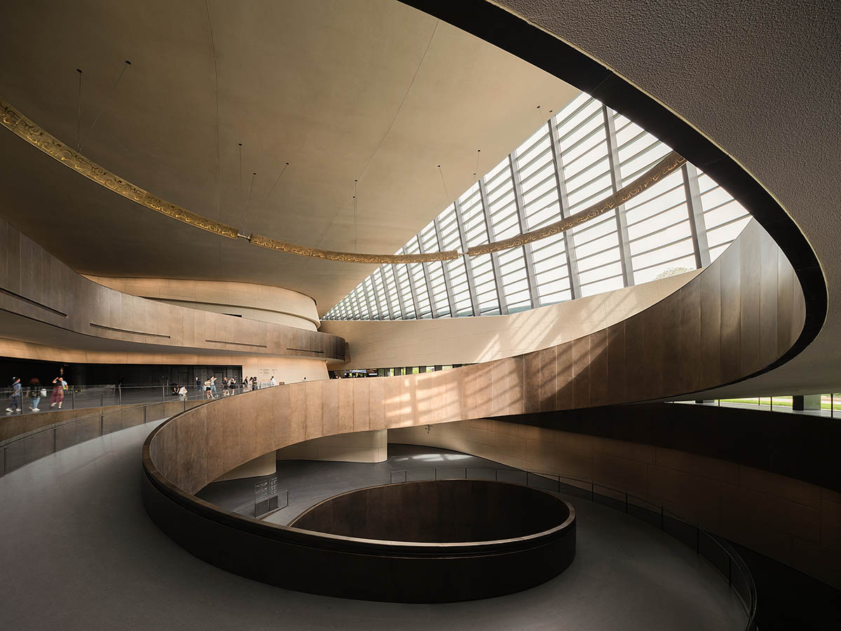 Mound-shaped museum by CSWADI rises from the earth like