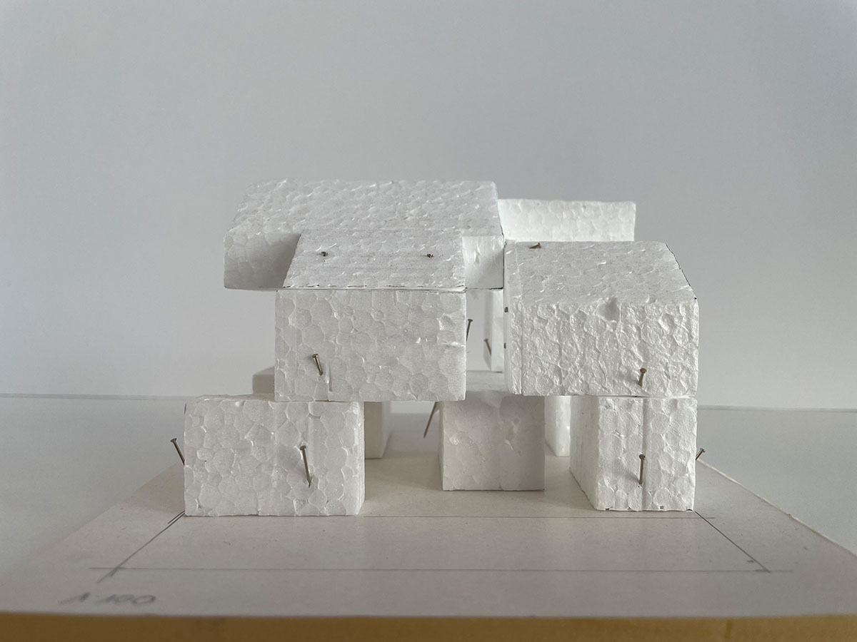 Residential barn features an unfinished, raw interior in Swiss rural landscape