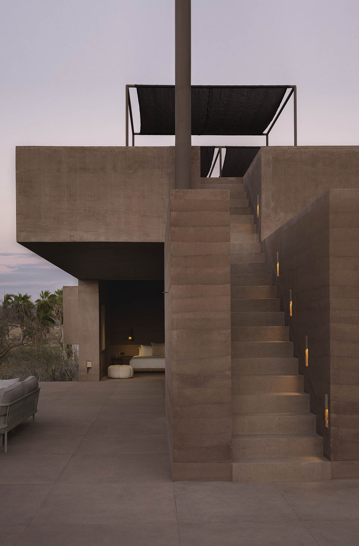 Rammed earth guesthouse by PPAA blends Mexican and Danish influences in Todos Santos
