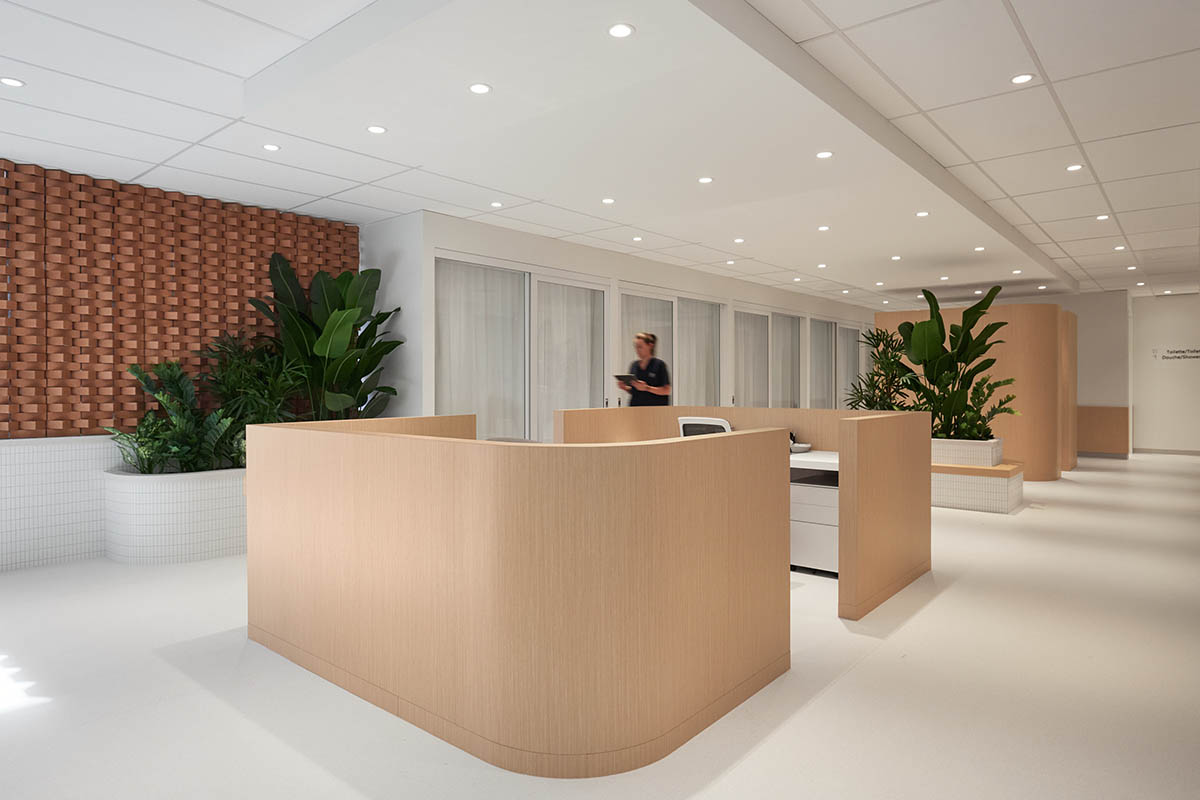 Surgical center features artisanal terracotta brick wall to reverse 