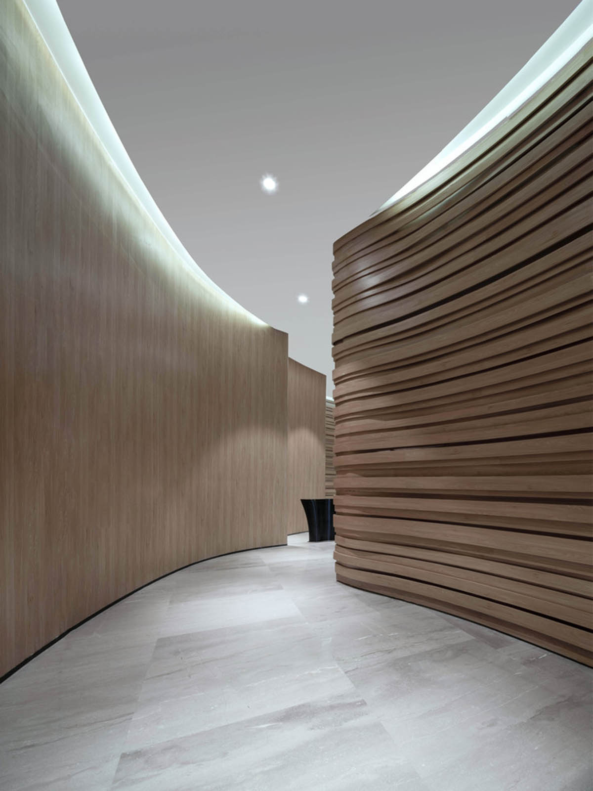 Community Center in Xi’an is raised on sculptural base that features a rippling effect