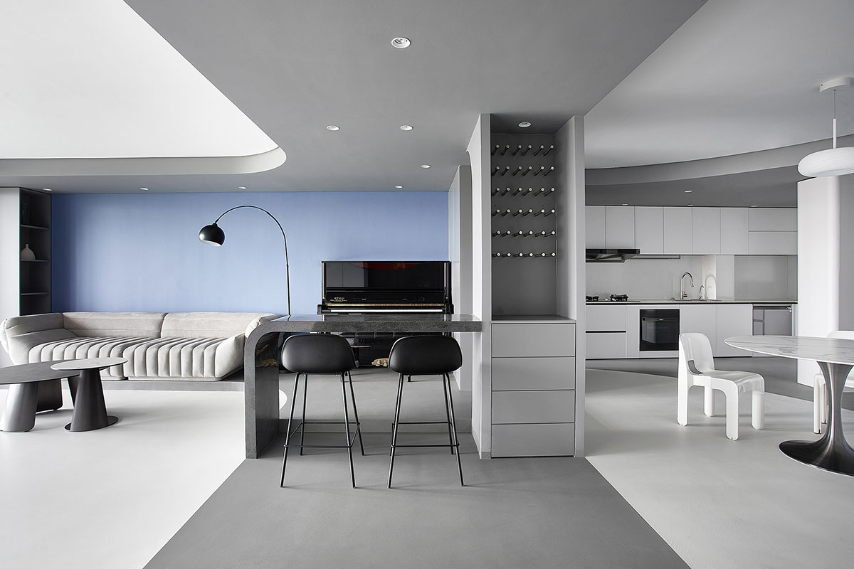 XIGO STUDIO creates gray and blue-colored interiors for apartment in Beijing 