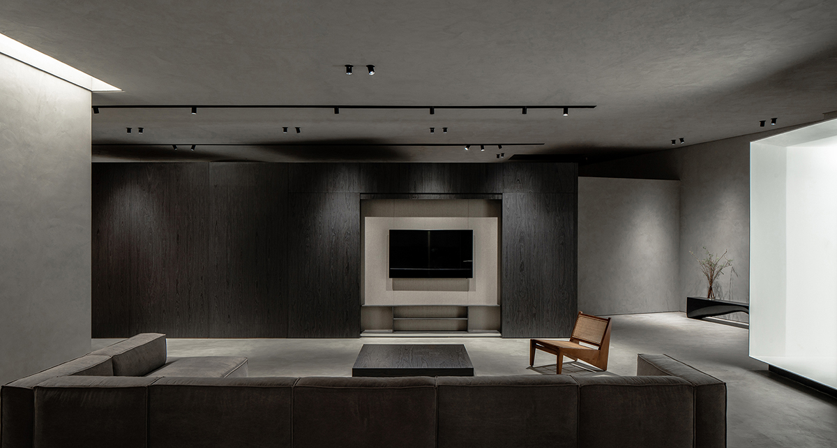 JST ARCHITECTURE creates dark-colored palette by adding a geometrical aesthetic to this showroom