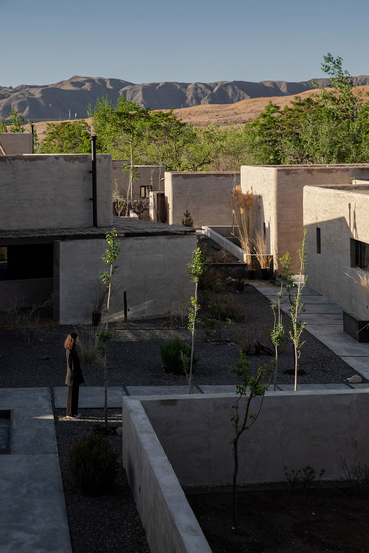 DAS Lab completes Lost Villa Boutique Hotel with earth-toned colours and smooth details in Ningxia