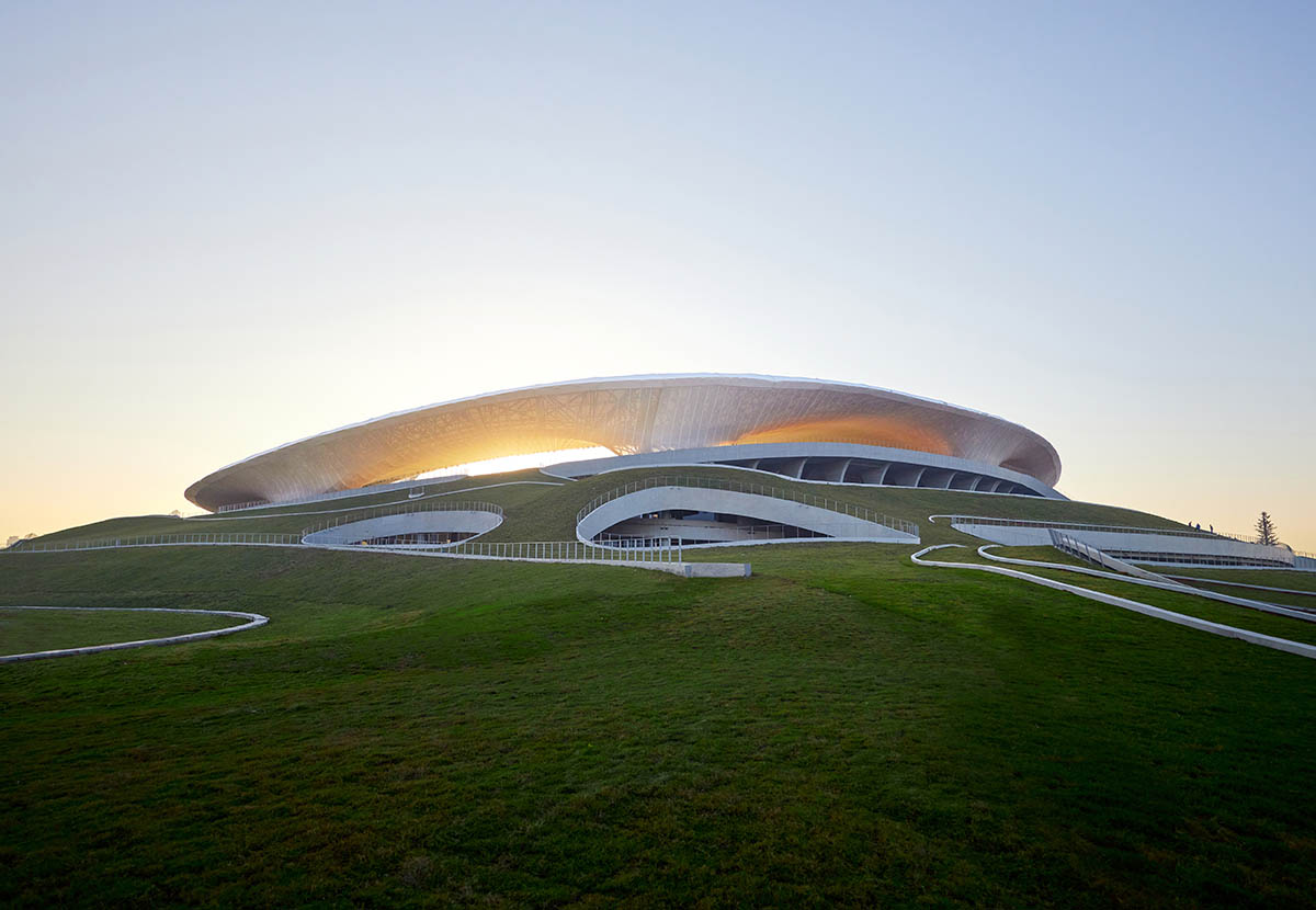 MAD completes the first signature stadium at Quzhou Sports Park crowned by undulating halo-like roof 