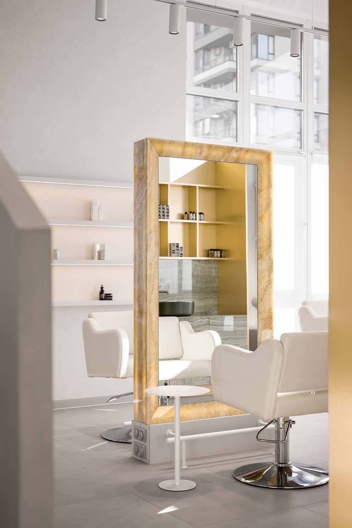 Mirrors and golden frames create a sense of care and deep comfort for beauty salon in Ukraine