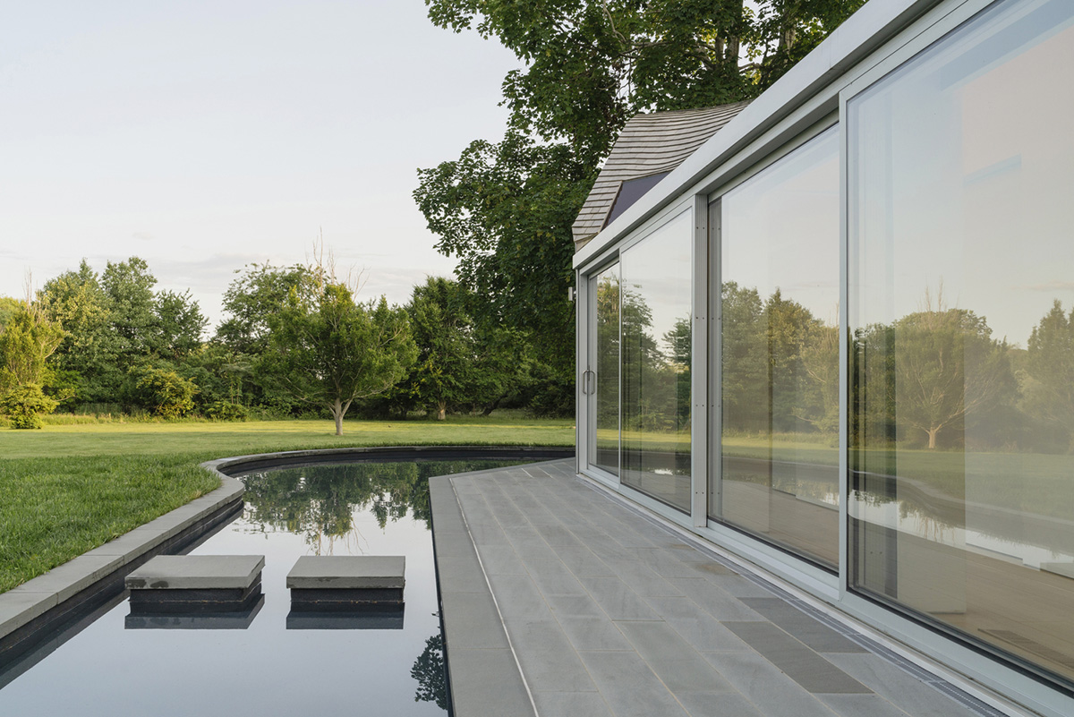 nea studio's cocoon-shaped residence in Long Island acts as a