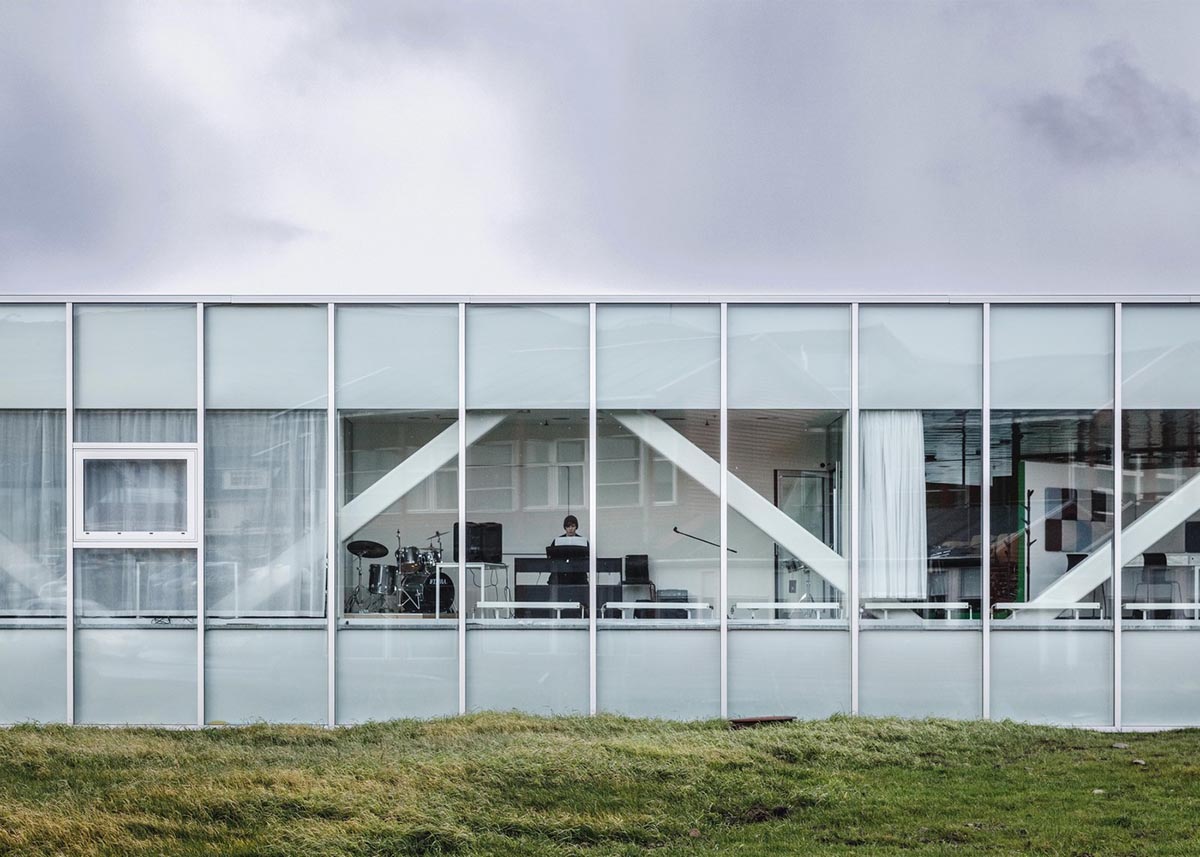 BIG's vortex-shaped education center combines three schools under one roof on the Faroe Islands
