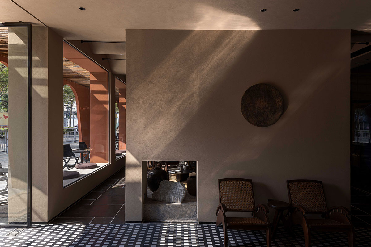 Fusion Design reveals seaside resort featuring red-colored and arched façade in Shenzhen