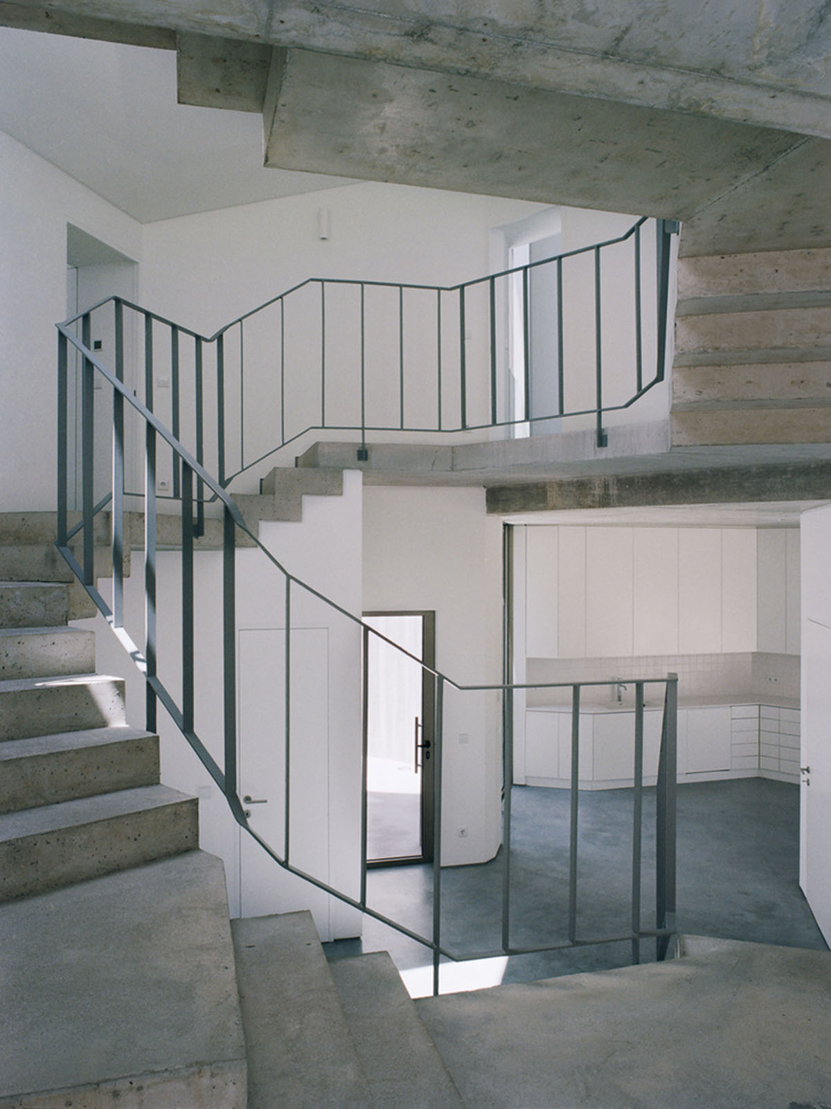 Double(o) Studio built Trefoil House with circular and hexagonal layout merged in one massing