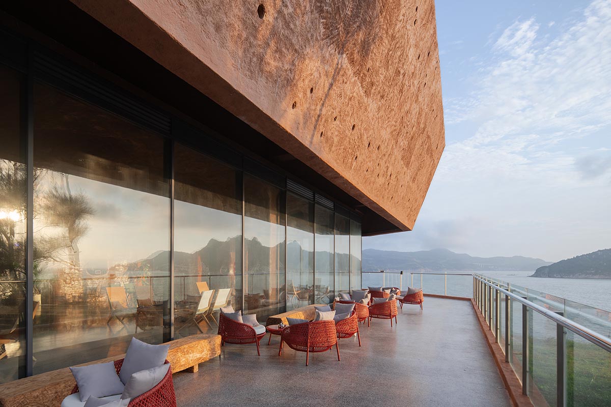 A gallery on a cliff features irregularly shaped lighting tubes that mimic marine creatures in China