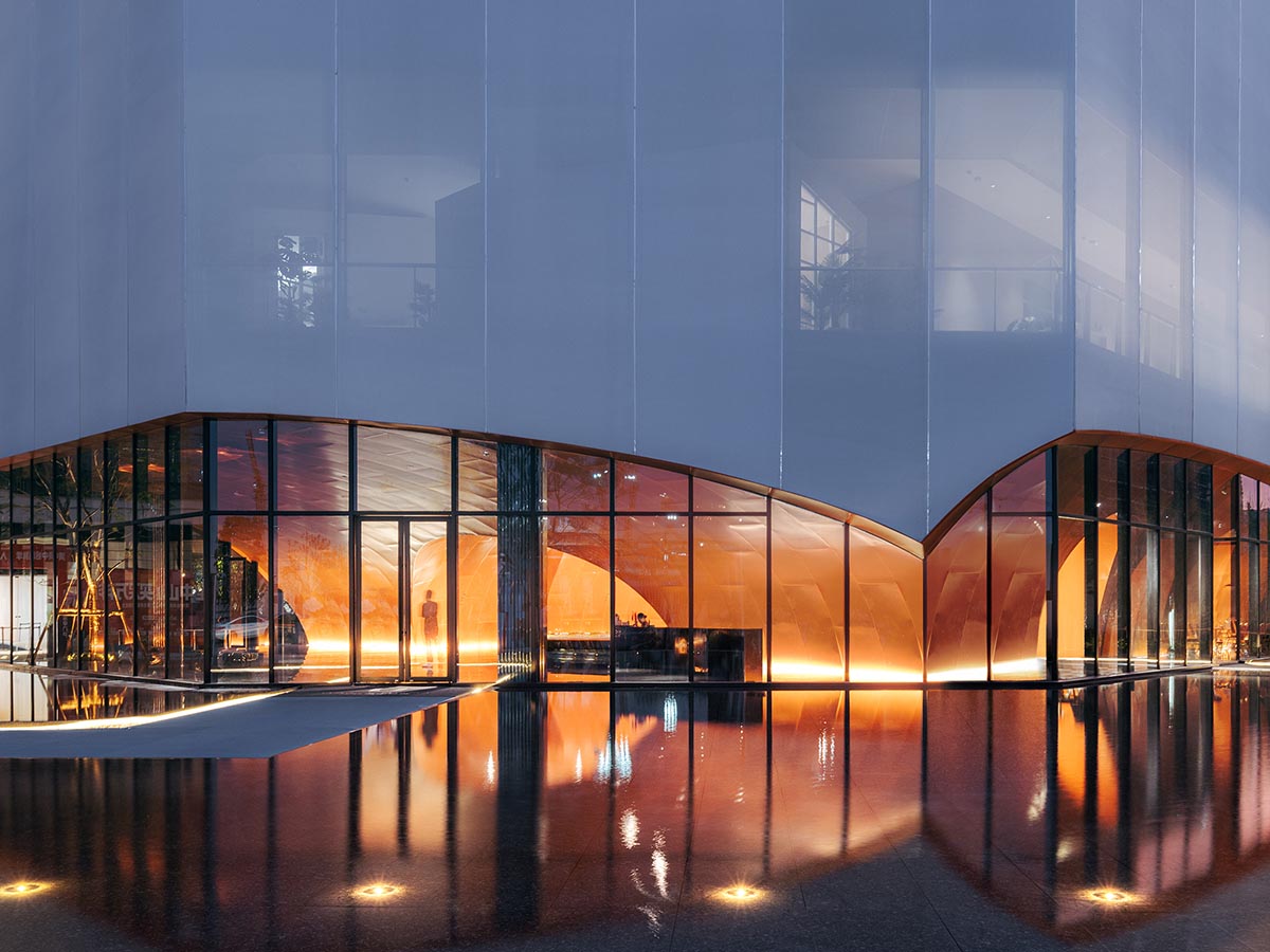 Wutopia Lab built showroom evoking Chinese red mountains with dazzling orange-colored roof