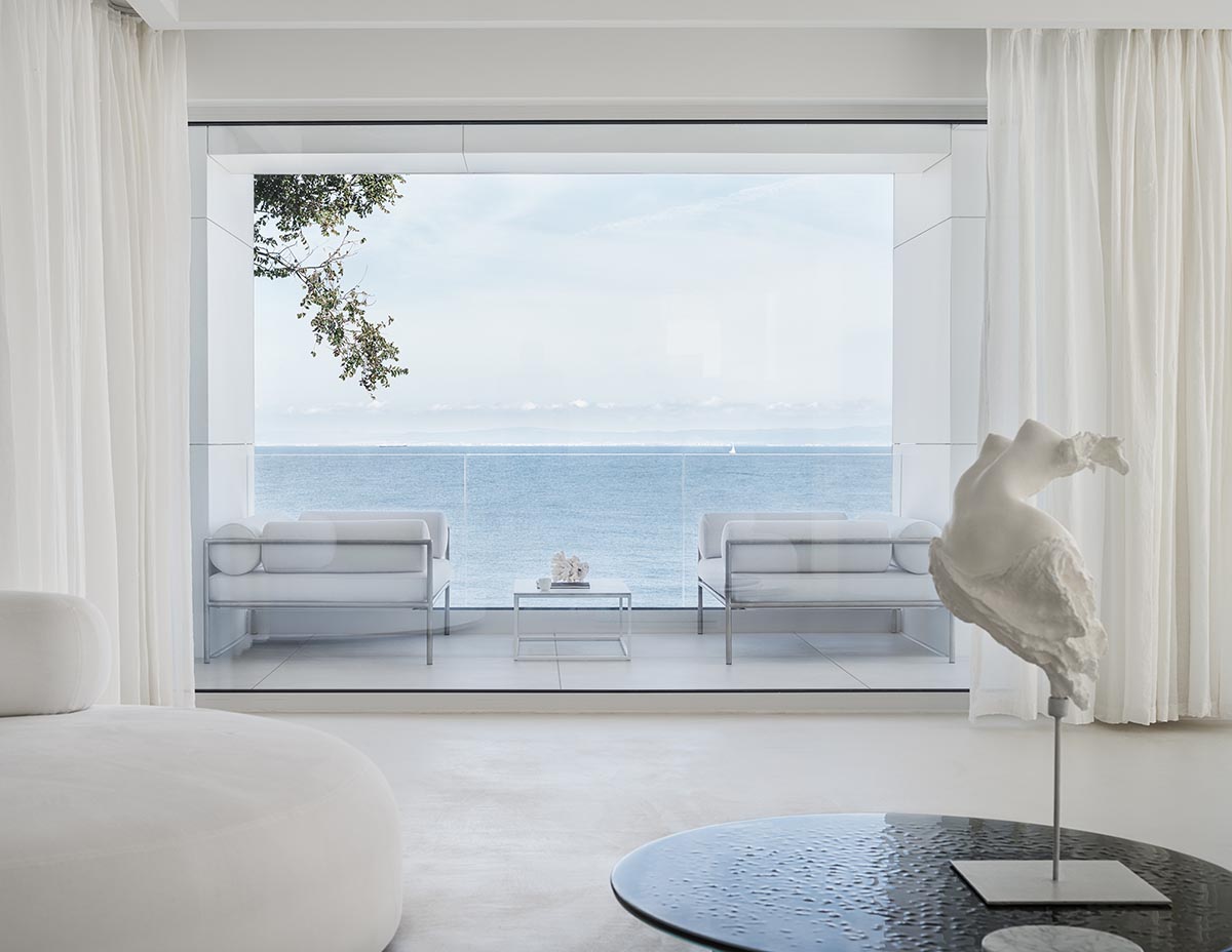 Simple Architecture renovates old house with gridded fa&ccedil;ade in Bulgaria